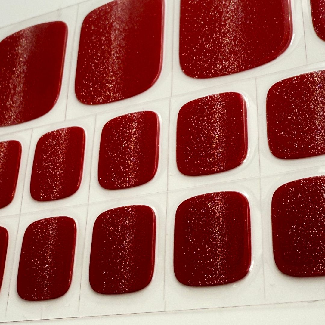 Burgundy cat eye semi-cured gel nail wraps pedicure